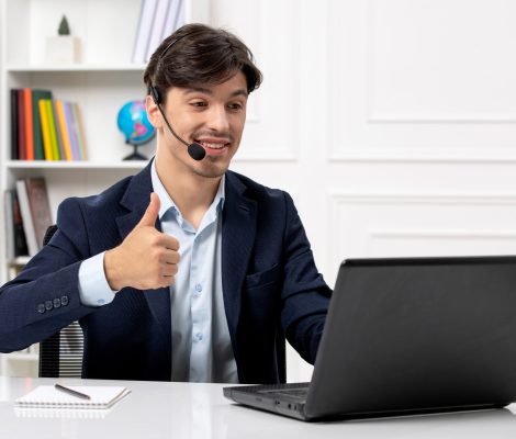 customer service handsome guy with headset laptop suit showing good gesture scaled 1